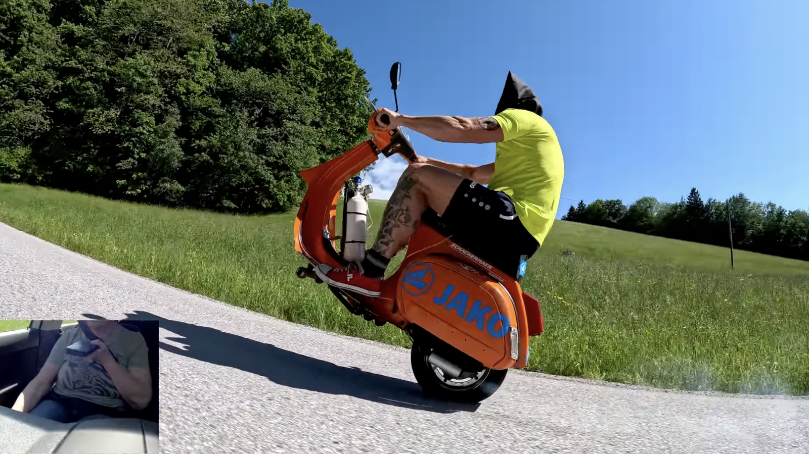 Stuntman Wheelies Vespa up a Mountain While Blindfolded